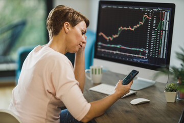 Woman Experiencing Stress During A Trading With Cryptocurrency From Home