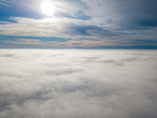 Fototapeta premium High flight over the fog. Aerial drone view.