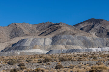 Huge tailing piles left over from industrial mining operation