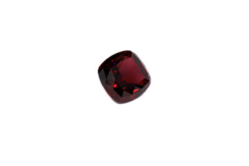 macro mineral stone garnet faceted on a white background