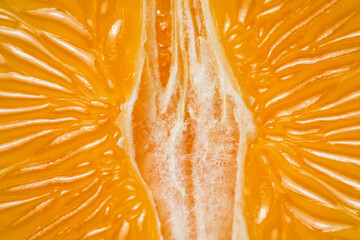 Closeup macro orange texture view on tangerine  
