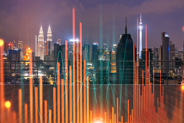Fototapeta na wymiar Rooftop with wooden terrace, Kuala Lumpur night skyline. Forecasting and business modeling of financial markets hologram digital charts. City downtown. Double exposure.