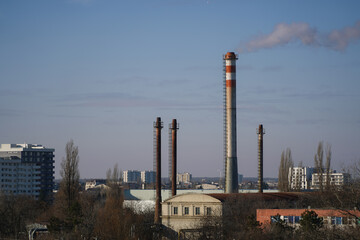The chimney of a thermal power plant, the smoke extracted by a thermal power plant on the chimney, in the production process. Environment. Pollution.