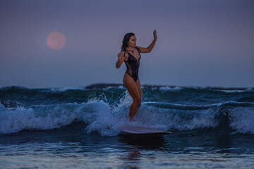 Early morning Moonlit surfing