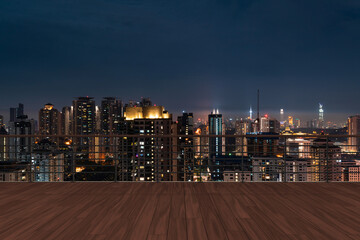 Fototapeta na wymiar Panoramic Kuala Lumpur skyline view, wooden observatory deck on rooftop, night. Asian corporate and residential lifestyle. Financial city downtown, real estate. Product display mockup empty roof