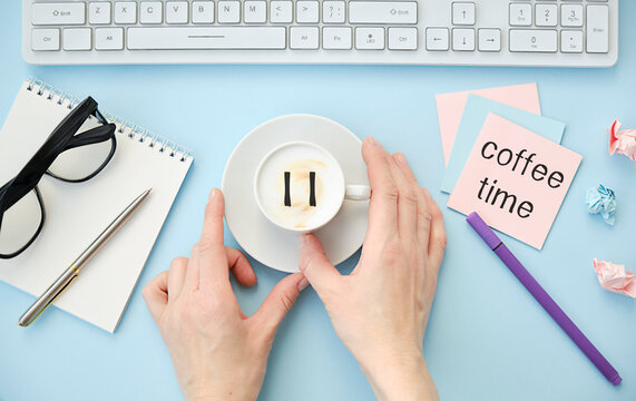 Coffee Break. Female Hands Touches White Cup Of Classic Coffee, Top View, Close Up. Pause Icon On Foam. Pause, Break, Short Breather, Relax, Pit Stop In The Middle Of Business Life.