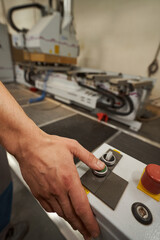Close up of male hand pressing the button