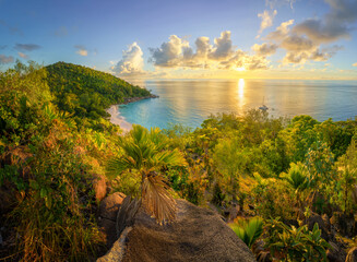 sunset at tropical beach anse georgette on praslin on the seychelles