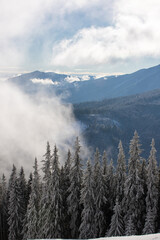 Landscape with the Rarau - Giumalau mountains seen in winter