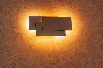 A lamp in the shape of three rectangles in a coffee shop!