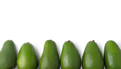 Ripe avocado on a white background, halves of avocado.