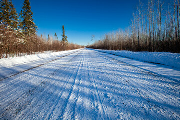 Obraz premium County road E in Merrill, Wisconsin after a snow storm