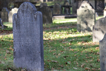 Outdoor view of old tombstones in a cemetery in Halifax, Germany - obrazy, fototapety, plakaty