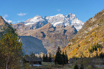Beautiful fall season landscape with the Monte Rosa in Valsesia, Province of Vercelli, Piedmont, Italy.