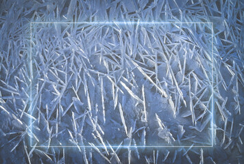 Natural winter ice background with a frame for inserting text. Abstract patterns on ice illuminated by the sun. Snow and frost.
