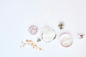 Wellness natural face care cosmetics set on white gradient background. Alginate mask,pipette and patches. Eco forest moss and oat. Hyaluronic and moisturizing cosmetic. Dermatology natural products