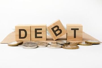 debt word written on wooden blocks. business concept. test sign, exam, concept. education quality control. business concept
