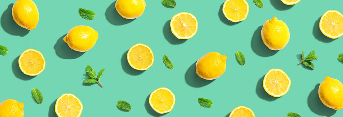 Fresh yellow lemons with mints overhead view - flat lay