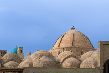 Fototapeta na wymiar Uzbekistan, city of Bukhara, view over the dome roof of the historic bazaar.