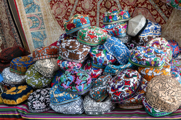 Uzbekistan, in the city of Bukhara, beautiful handmade traditional caps.