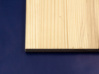 The photo shows a part of a white pine board. It can be used in production processes in various industries.