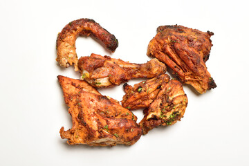 Pieces of Tandoori Chicken on White Background, Famous Indian Food Spicy Tandoori Chicken