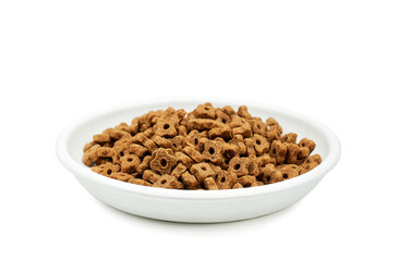 Pet food Dry food in bowl isolated on white Cat or dog kibble food
