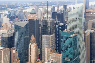 Aerial panoramic city view of Time Square area, Manhattan West Side neighborhoods and the Hudson River view with New Jersey bank, New York city, USA. Iconic cityscape of building exteriors of NYC