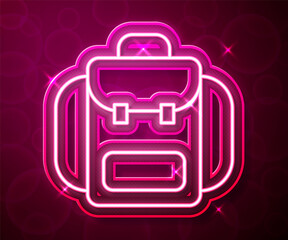 Glowing neon line Hiking backpack icon isolated on red background. Camping and mountain exploring backpack. Vector