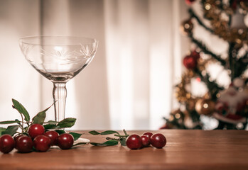 Flavored red fruit cider accompanied by cherries, background Christmas themes
