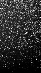 Random white dots Christmas background. Subtle fly