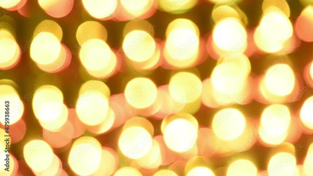 Canvas Prints glowing and iridescent lights of bokeh. round golden lights flash, shimmer and move against a dark b