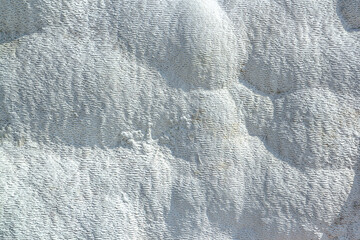 Stone texture covered with calcium deposits. Pamukale texture