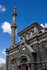 Kars, Eastern Anatolia, Turkey: Formerly a Russian Orthodox church with two onion domes, the dark stone Fethiye Camii (Fethiye Mosque) now has twin minarets.