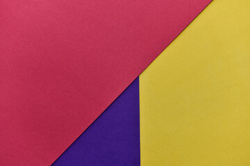 abstract geometric paper background. violet, yellow and red trendy colors. The backdrop for an...