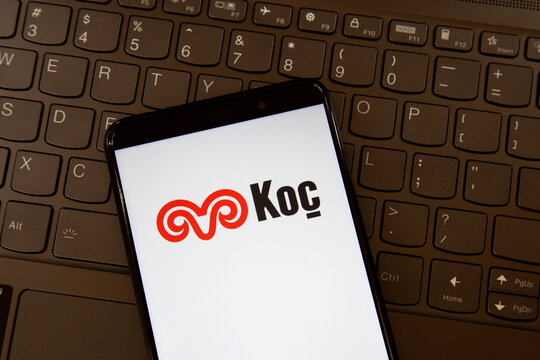 Toronto, On, Canada - December 19, 2021:  KOC logo on smartphone screen on a keyboard. Ko&ccedil; Holding A.Ş. is an industrial conglomerate in Turkey.