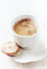  Cup of Coffee on bright stone background. Close up.