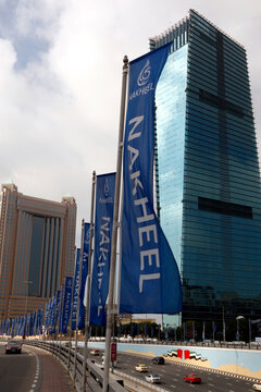 Flags for property company Nakheel are seen on the Sheik Zayed highway in Dubai