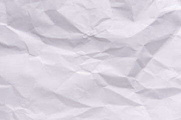 White crumpled paper texture background.