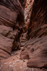 The Walls Slope From Erosion Around a Curve In Buckskin Gulch