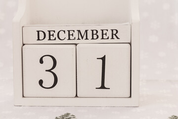 December 31th, New Year’s Day. Day 31 of month, date calendar on winter background.  White block...