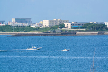 Obraz premium Sunny view of boat, building in the Penghu Island