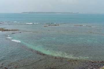 Twin Hearts Stone Weir cover in water at Penghu island