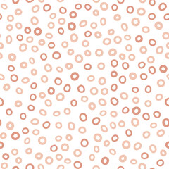 Abstract spotted seamless pattern in pastel colors. Beige dotted background. Vector hand-drawn illustration. Perfect for print, decorations, wrapping paper, covers, invitations, cards.