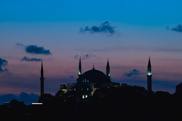 Hagia Sophia. Ayasofya Mosque or Hagia Sophia at dusk with crescent moon © senerdagasan
