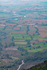 Fototapeta na wymiar Harvested farmland. Harvested farmlands from above. Agricultural fields