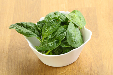 Fresh green spinach leaves in the bowl