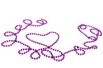 Purple beads a heart shaped on white background. A beautiful chain. Decorative element.