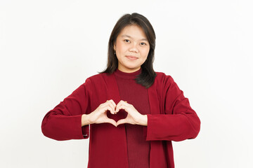 Showing Love Sign Of Beautiful Asian Woman Wearing Red Shirt Isolated On White Background