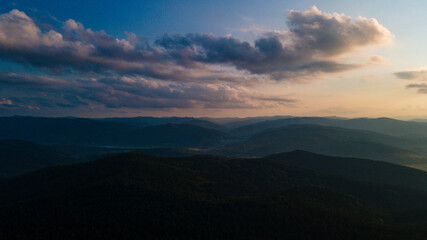 Mountains forest at sunset top view